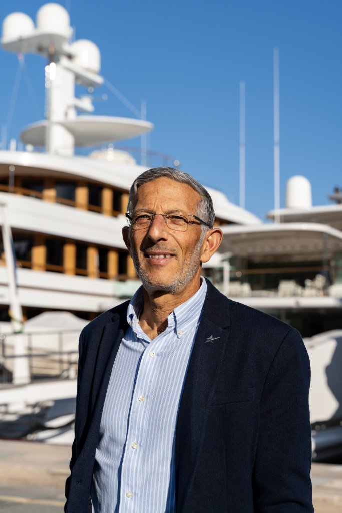 Steve Huppert standing on Monaco harbour